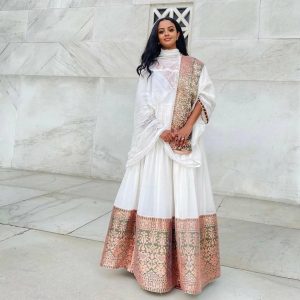 Elegant Sleeveless Habesha Dress with Vibrant Tilf: A Modern Ethiopian Dress