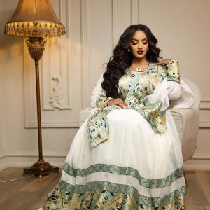 Striking Traditional Look in Green Ethiopian Dress: Daring Slit on Habesha Dress Contemporary Habesha Kemis