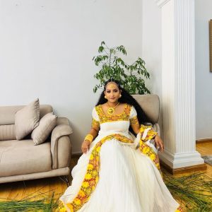 Heavenly Look with Traditional Ethiopian Dress: Yellow Based Intricately Embroidered Habesha Dress