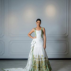 Elegant Green Mermaid Habesha Dress with Rich Golden Accents