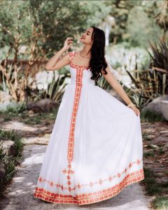 Elegant Habesha Kemis with Bold Red Embroidery for Celebrations: Traditional Ethiopian Dress